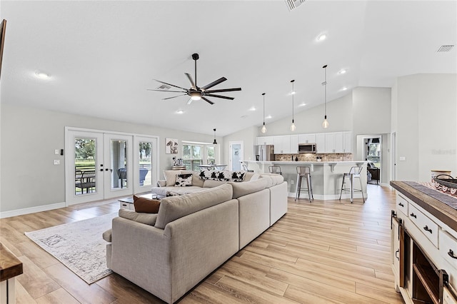 5478 NW 153rd Ct, Morriston, FL 32668 - living area with ceiling fan, high vaulted ceiling, light wood-type flooring, recessed lighting, and french doors