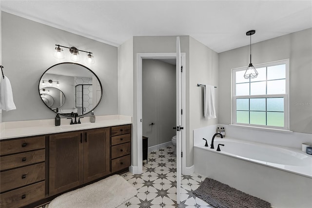 5478 NW 153rd Ct, Morriston, FL 32668 - full bath featuring a garden tub, vanity, toilet, baseboards, and tile patterned floors