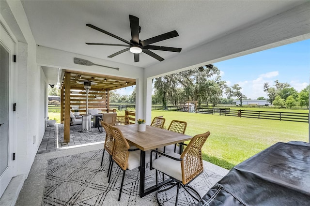 5478 NW 153rd Ct, Morriston, FL 32668 - view of patio / terrace with outdoor dining area and a ceiling fan