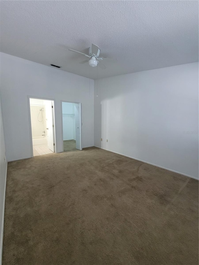 3124 S Semoran Blvd Unit 206, Orlando, FL 32822 - empty room featuring ceiling fan, light colored carpet, and a textured ceiling