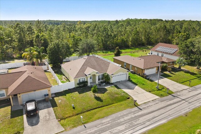 1321 Dunbarton Ct, Kissimmee, FL 34758 - view of subject property with a forest