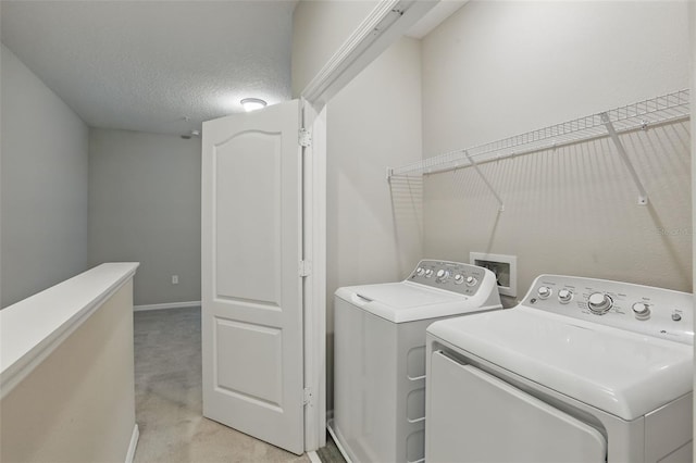 328 Cedar Bark Ln, Sanford, FL 32771 - laundry area with washer and clothes dryer, light colored carpet, and baseboards