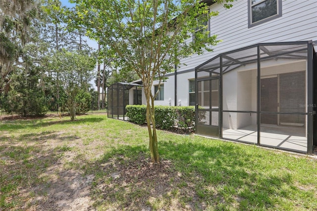 328 Cedar Bark Ln, Sanford, FL 32771 - view of green lawn featuring a lanai