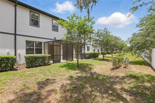 328 Cedar Bark Ln, Sanford, FL 32771 - view of green lawn featuring glass enclosure