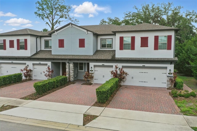 328 Cedar Bark Ln, Sanford, FL 32771 - multi unit property with a garage, driveway, and stucco siding