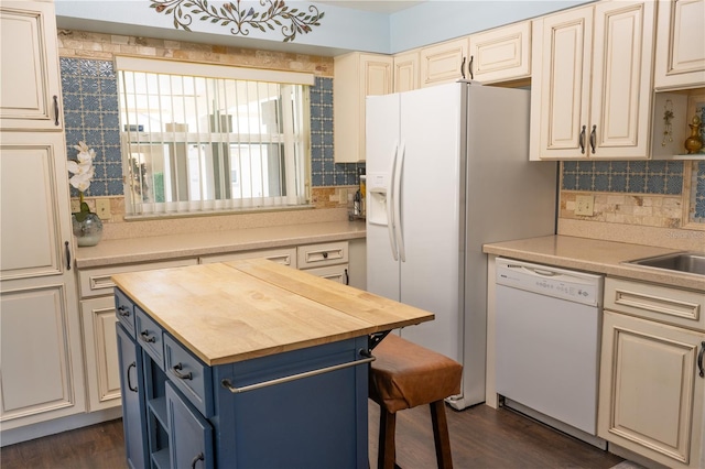 314 Windmeadows St Unit 314, Altamonte Springs, FL 32701 - kitchen featuring white appliances, butcher block countertops, blue cabinetry, and backsplash