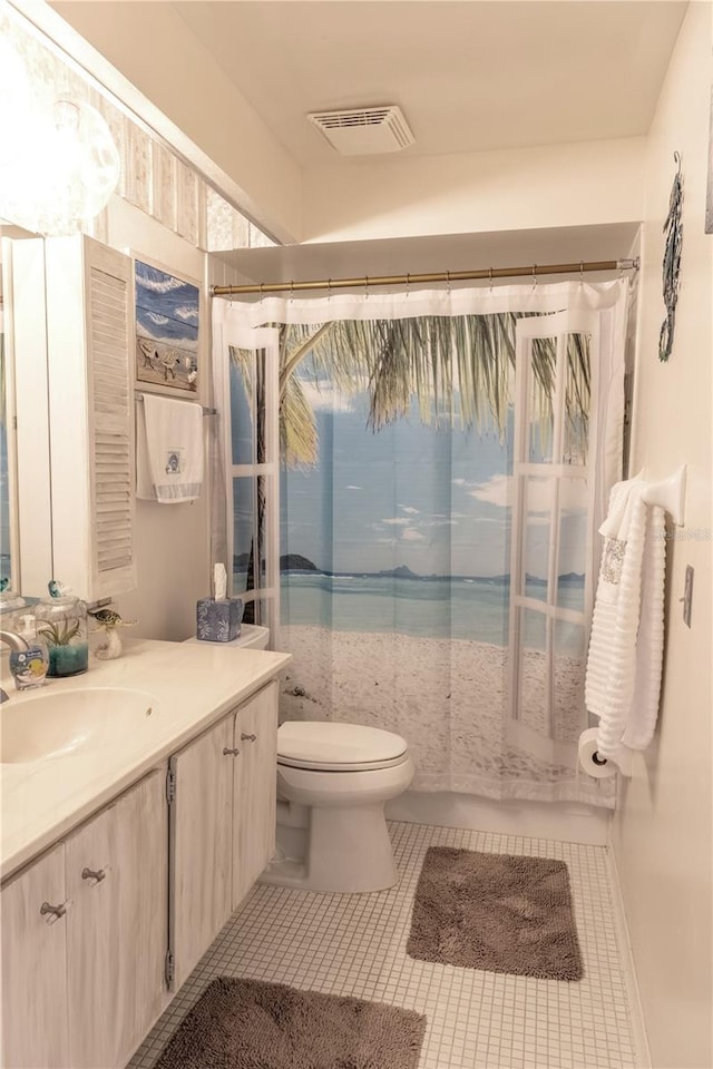 314 Windmeadows St Unit 314, Altamonte Springs, FL 32701 - bathroom with vanity, toilet, tile patterned floors, and a shower with shower curtain