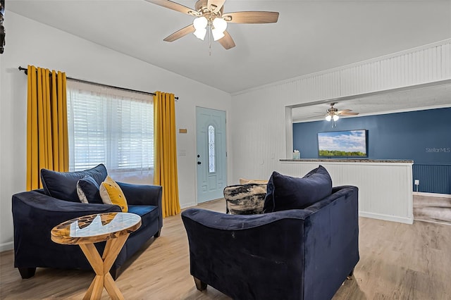 826 Cherokee Cir, Sanford, FL 32773 - living area with ceiling fan, lofted ceiling, light wood-style flooring, and baseboards