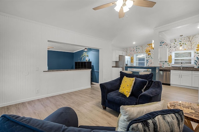 826 Cherokee Cir, Sanford, FL 32773 - living room with light wood-style floors, a ceiling fan, ornamental molding, and baseboards