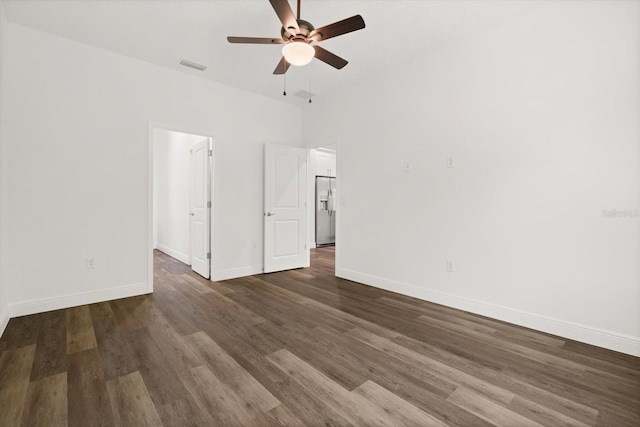 1119 W 7th St, Sanford, FL 32771 - unfurnished room with a ceiling fan, wood finished floors, and baseboards