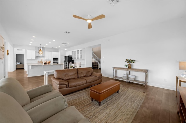 16086 Johns Lake Overlook Dr, Winter Garden, FL 34787 - living area featuring stairs, baseboards, a ceiling fan, recessed lighting, and dark wood finished floors