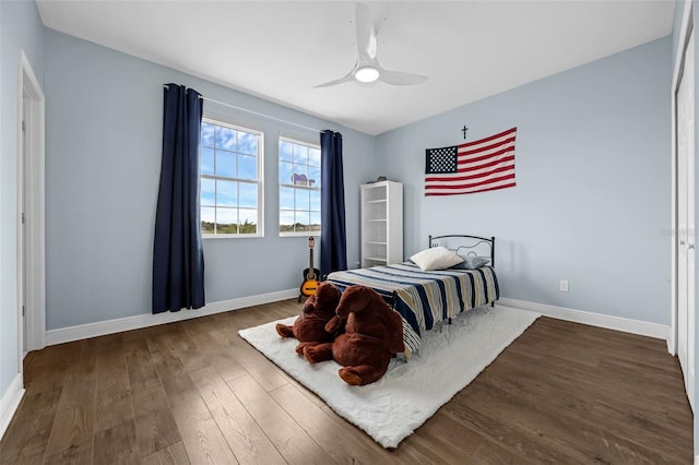 16086 Johns Lake Overlook Dr, Winter Garden, FL 34787 - bedroom featuring wood finished floors, baseboards, and a ceiling fan