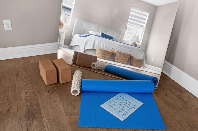 16086 Johns Lake Overlook Dr, Winter Garden, FL 34787 - bedroom featuring wood finished floors and baseboards