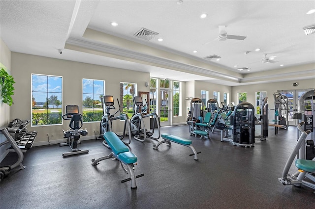 16086 Johns Lake Overlook Dr, Winter Garden, FL 34787 - workout area with recessed lighting, a ceiling fan, a tray ceiling, and baseboards