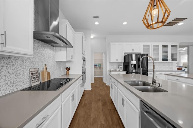 16086 Johns Lake Overlook Dr, Winter Garden, FL 34787 - kitchen with wall chimney range hood, black electric stovetop, a sink, refrigerator with ice dispenser, and dishwasher