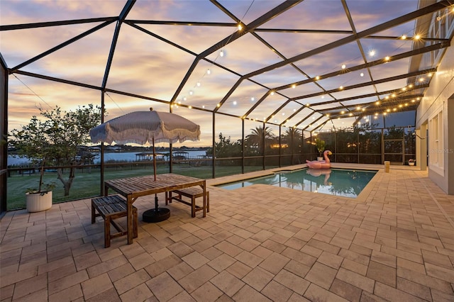 16086 Johns Lake Overlook Dr, Winter Garden, FL 34787 - outdoor pool with a patio area and glass enclosure