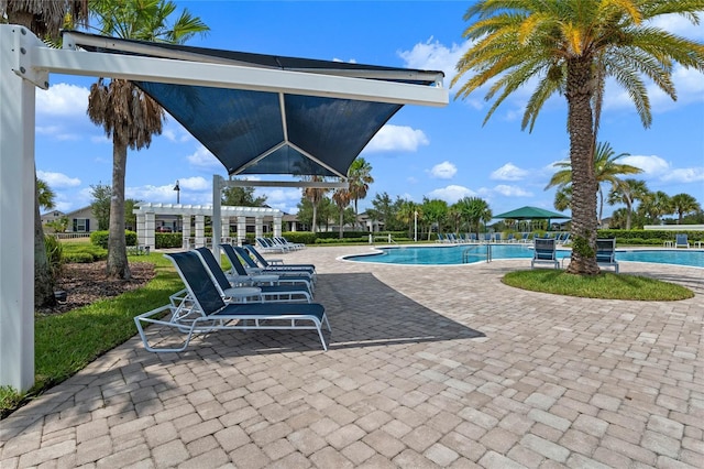 16086 Johns Lake Overlook Dr, Winter Garden, FL 34787 - community pool with a patio area and a pergola