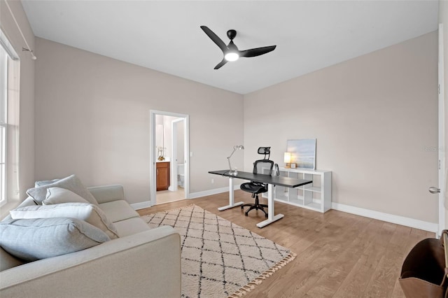 16086 Johns Lake Overlook Dr, Winter Garden, FL 34787 - office space featuring a ceiling fan, light wood-style floors, and baseboards