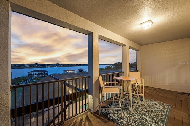 16086 Johns Lake Overlook Dr, Winter Garden, FL 34787 - balcony at dusk with a water view