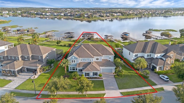 16086 Johns Lake Overlook Dr, Winter Garden, FL 34787 - aerial perspective of suburban area featuring a large body of water and property boundaries highlighted
