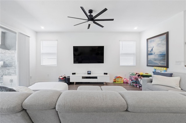 2227 Blue Salvia St, Clermont, FL 34711 - living area featuring a ceiling fan, plenty of natural light, recessed lighting, and wood finished floors