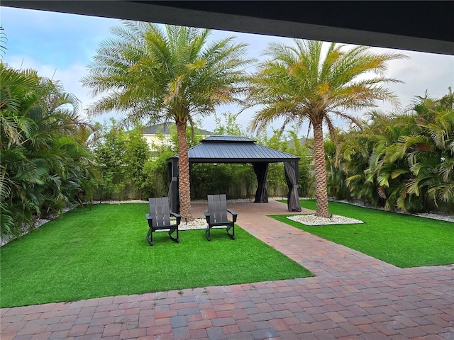 2227 Blue Salvia St, Clermont, FL 34711 - view of grassy yard with a gazebo and a patio