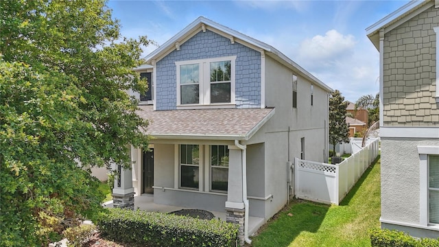 10172 Storey Grove Way, Winter Garden, FL 34787 - view of front of property featuring roof with shingles and stucco siding
