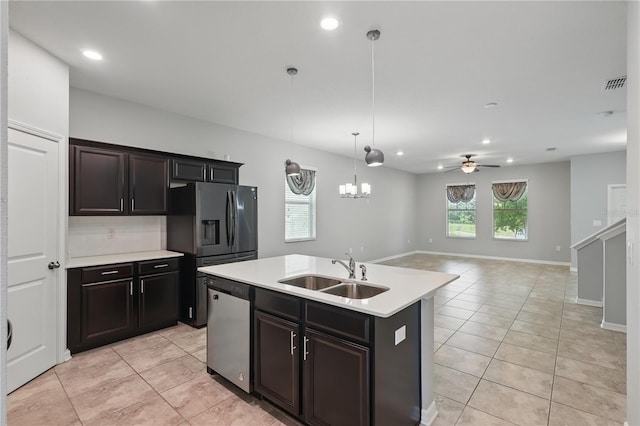 10172 Storey Grove Way, Winter Garden, FL 34787 - kitchen featuring appliances with stainless steel finishes, a sink, light countertops, light tile patterned floors, and recessed lighting