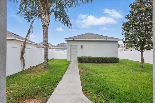 10172 Storey Grove Way, Winter Garden, FL 34787 - view of home's exterior featuring stucco siding and roof with shingles