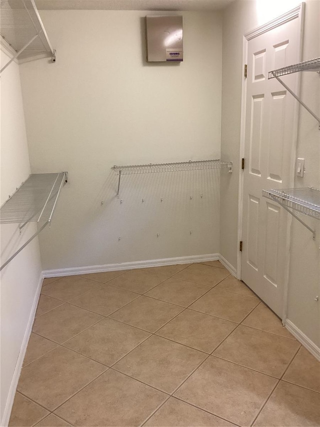 2143 Autumn View Dr, Orlando, FL 32825 - spacious closet featuring light tile patterned flooring