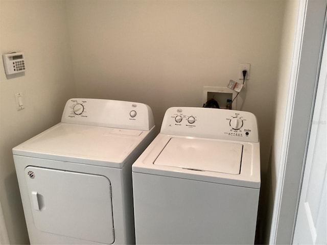 2143 Autumn View Dr, Orlando, FL 32825 - washroom featuring washer and dryer