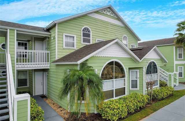 8719 Rockingham Ter Unit B, Kissimmee, FL 34747 - view of side of home with roof with shingles