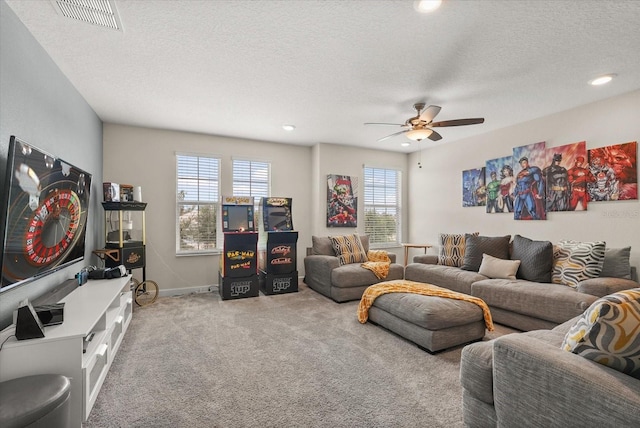 8811 Bally Neal Loop, Davenport, FL 33896 - carpeted living room with a ceiling fan, a textured ceiling, recessed lighting, and baseboards