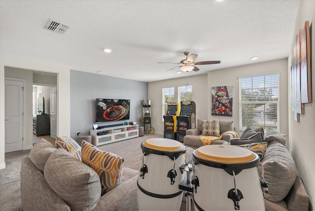 8811 Bally Neal Loop, Davenport, FL 33896 - living area featuring ceiling fan, carpet flooring, a textured ceiling, recessed lighting, and baseboards