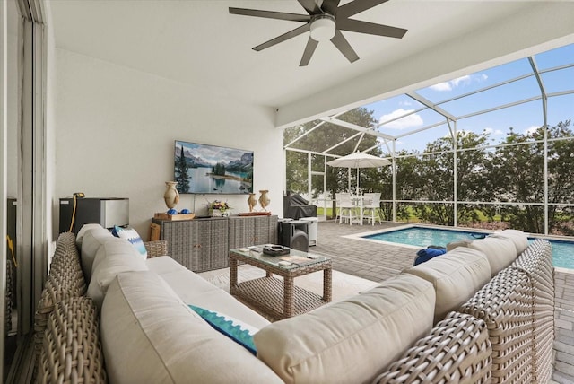 8811 Bally Neal Loop, Davenport, FL 33896 - swimming pool with an outdoor living space, a patio area, a ceiling fan, and glass enclosure