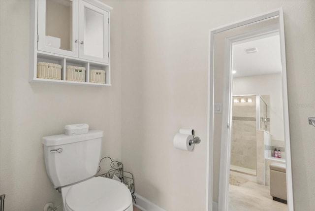 8811 Bally Neal Loop, Davenport, FL 33896 - bathroom with toilet and a tile shower