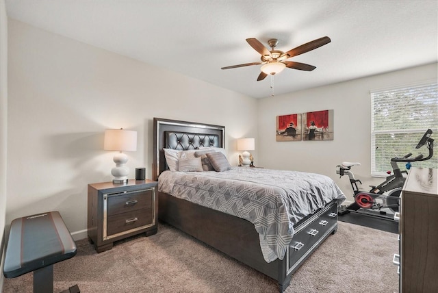 8811 Bally Neal Loop, Davenport, FL 33896 - carpeted bedroom featuring baseboards and a ceiling fan