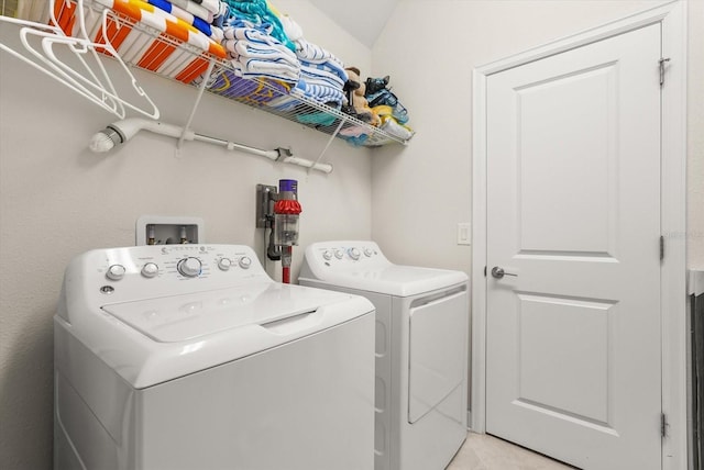 8811 Bally Neal Loop, Davenport, FL 33896 - washroom featuring independent washer and dryer
