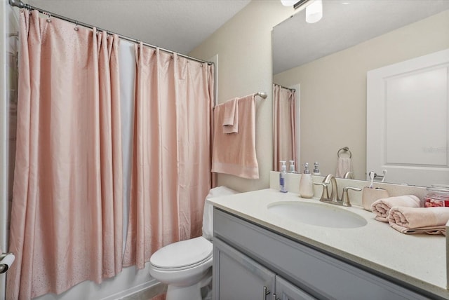 8811 Bally Neal Loop, Davenport, FL 33896 - full bathroom with vanity, toilet, and shower / tub combo with curtain