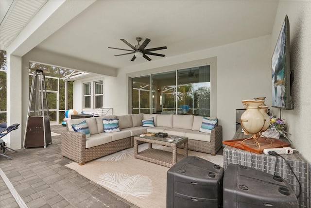 8811 Bally Neal Loop, Davenport, FL 33896 - view of patio with an outdoor hangout area, ceiling fan, and glass enclosure