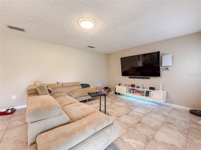 6047 Shore Line Dr, Orlando, FL 32819 - tiled living room with baseboards and a textured ceiling