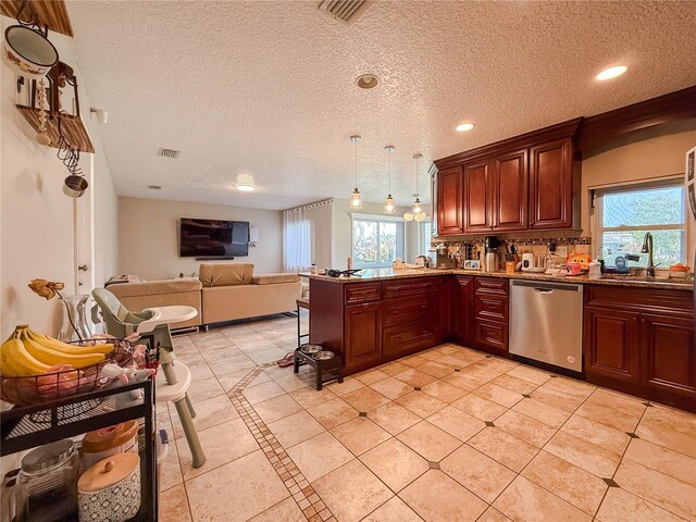 6047 Shore Line Dr, Orlando, FL 32819 - kitchen featuring dishwasher, a sink, light tile patterned floors, healthy amount of natural light, and recessed lighting