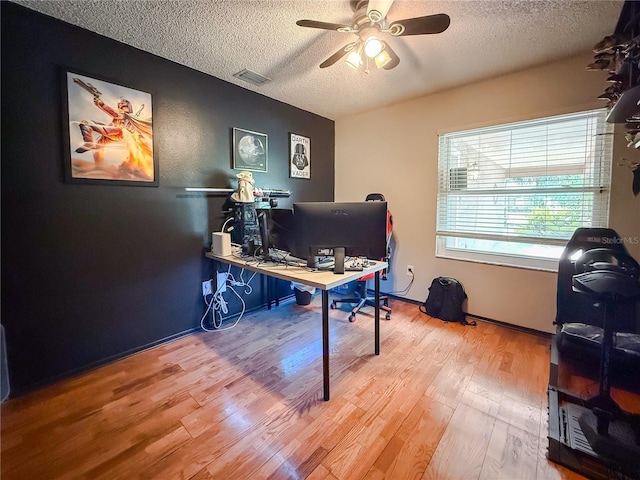6047 Shore Line Dr, Orlando, FL 32819 - office space with a textured ceiling, ceiling fan, and wood finished floors