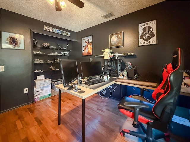 6047 Shore Line Dr, Orlando, FL 32819 - office with a textured ceiling, wood finished floors, and a ceiling fan