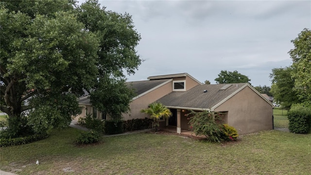6047 Shore Line Dr, Orlando, FL 32819 - view of front of house featuring stucco siding