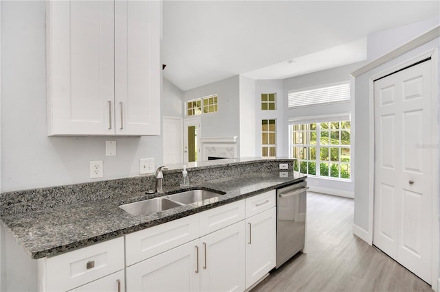 1525 Farrindon Cir, Lake Mary, FL 32746 - kitchen with a sink, dishwasher, light wood-style floors, and white cabinets