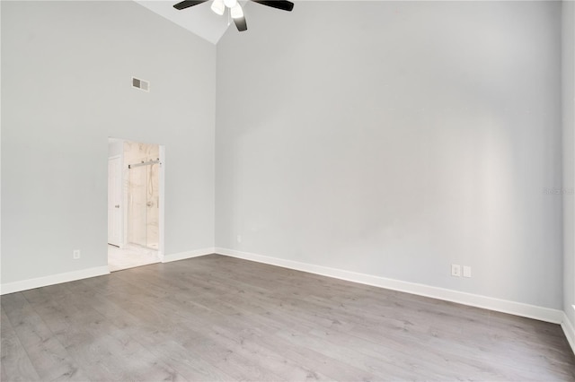 1525 Farrindon Cir, Lake Mary, FL 32746 - spare room featuring high vaulted ceiling, ceiling fan, baseboards, and wood finished floors