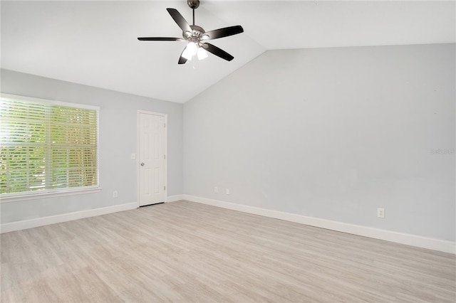 1525 Farrindon Cir, Lake Mary, FL 32746 - spare room with light wood-style floors, vaulted ceiling, ceiling fan, and baseboards