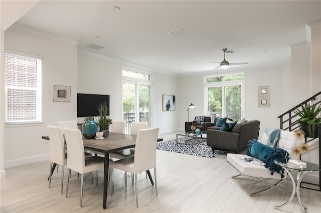 141 S Park Ave, Winter Garden, FL 34787 - dining area featuring healthy amount of natural light, a ceiling fan, light wood-style floors, baseboards, and ornamental molding