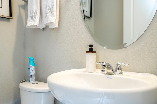 12259 Bracco St, Winter Garden, FL 34787 - half bathroom featuring a sink and toilet